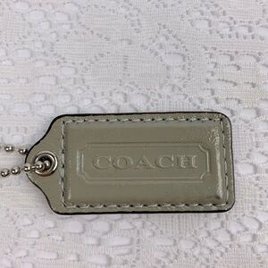 Coach Leather Hang Tag Charm Silver chain gray Taupe Leather Embossed Coach Logo